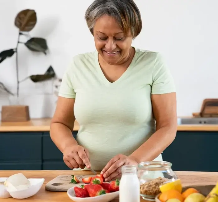 Woman preparing a healthy meal at home
